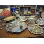 A selection of silver and silver late to include a silver tea strainer, a circular silver plated