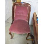 A late Victorian mahogany chair on cabriole legs