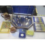 A mixed lot to include two cased sets of cutlery, two Doulton jugs, coronation programme,