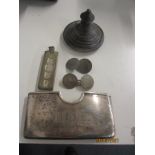 Silver items to include a silver ingot, business card holder, a silver lid together with a pair of