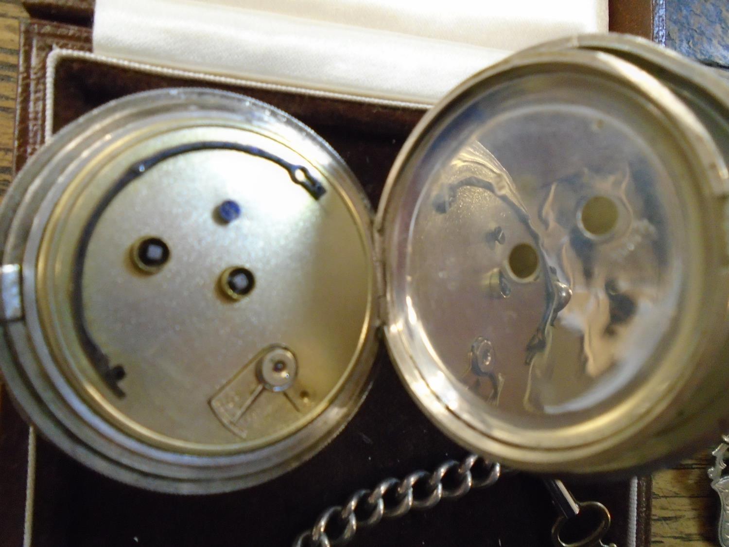 An Edwardian silver cased, key-wound pocket watch, white enamel dial with roman numerals and off set - Image 3 of 4