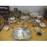 A collection of silver plated items to include a 3 piece tea set, tankards, trophies and other