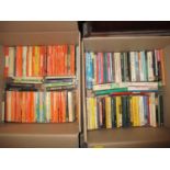 A collection of paperback books, mainly published by Penguin in two boxes Location: G