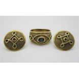 A 9ct gold Byzantine ring and earrings set with a single sapphire, total weight 14.61g Location: Cab