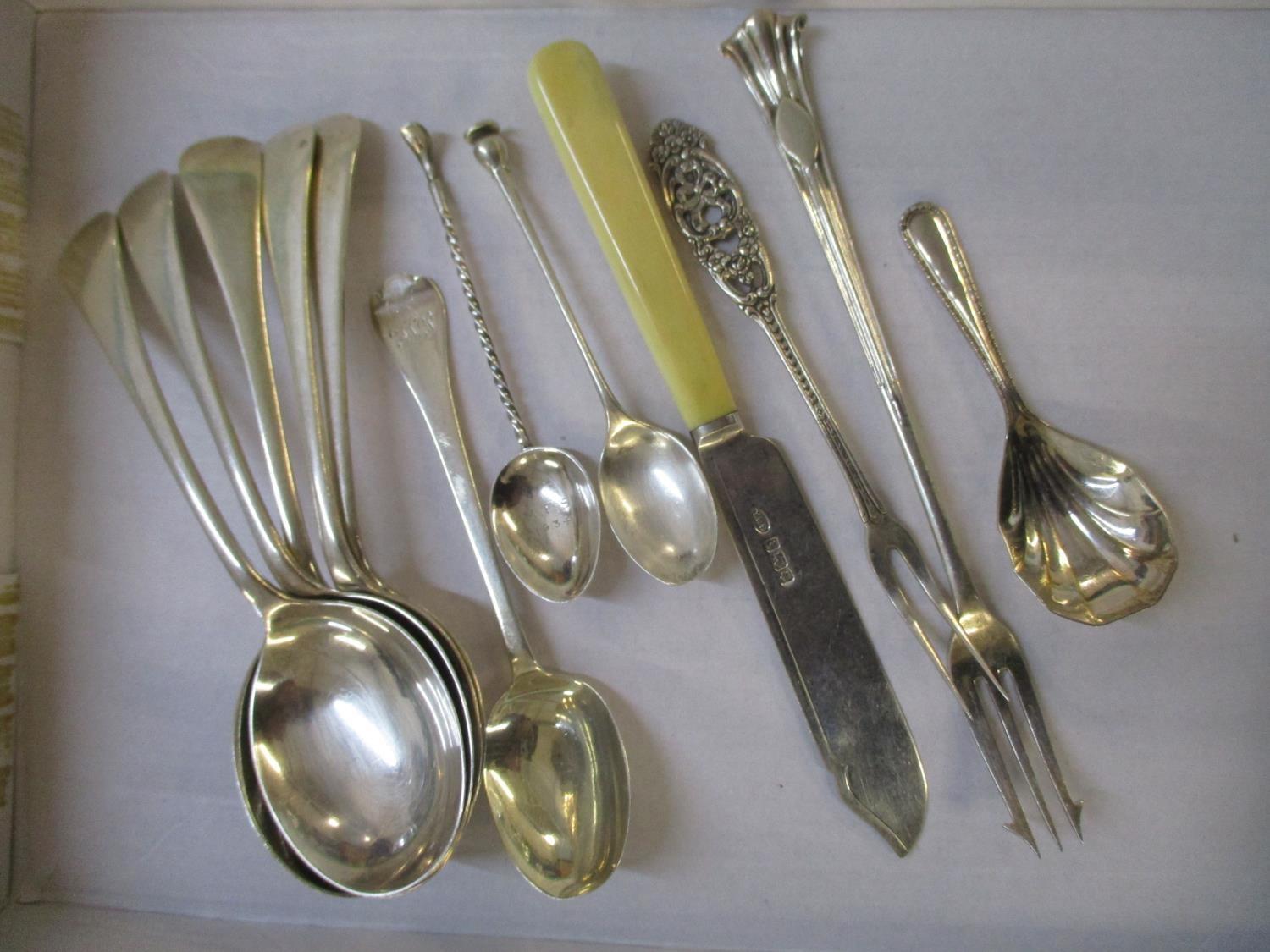 A small collection of 20th century silver cutlery to include a set of five spoons by William