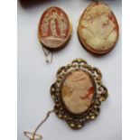 Two 18ct gold framed cameo brooches stamped 750 together with a yellow metal cameo brooch with