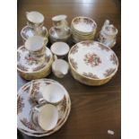 A Colclough bone china tea and part dinner service, mixed pictures, glass, bottle openers and