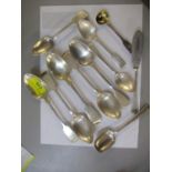 A collection of Victorian silver spoons and cake slice, 323g Location: Cab