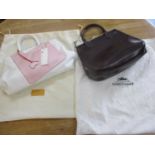 A Radley white and pink leather handbag, new with tags, together with a branded dust bag and a