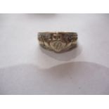 A 9ct gold and diamond friendship ring marked 375 and monogrammed with the letter P, total weight