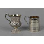 A Victorian silver gilt christening cup by Charles Lias, London 1840, with embossed floral detail