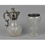 A Victorian cut glass and silver plated claret jug, the baluster shaped body with hobnail detail and