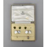 An Asprey cased set of dress studs and cuff links to include a pair of 18ct gold, platinum, mother