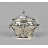 An Edward VII silver tea caddy by William Hutton & Sons, London, 1903, of bombe form with embossed c