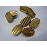 A pair of 9ct gold cuff links, 8.7g and a pair of silver gilt cufflinks, (total weight 16.7g)