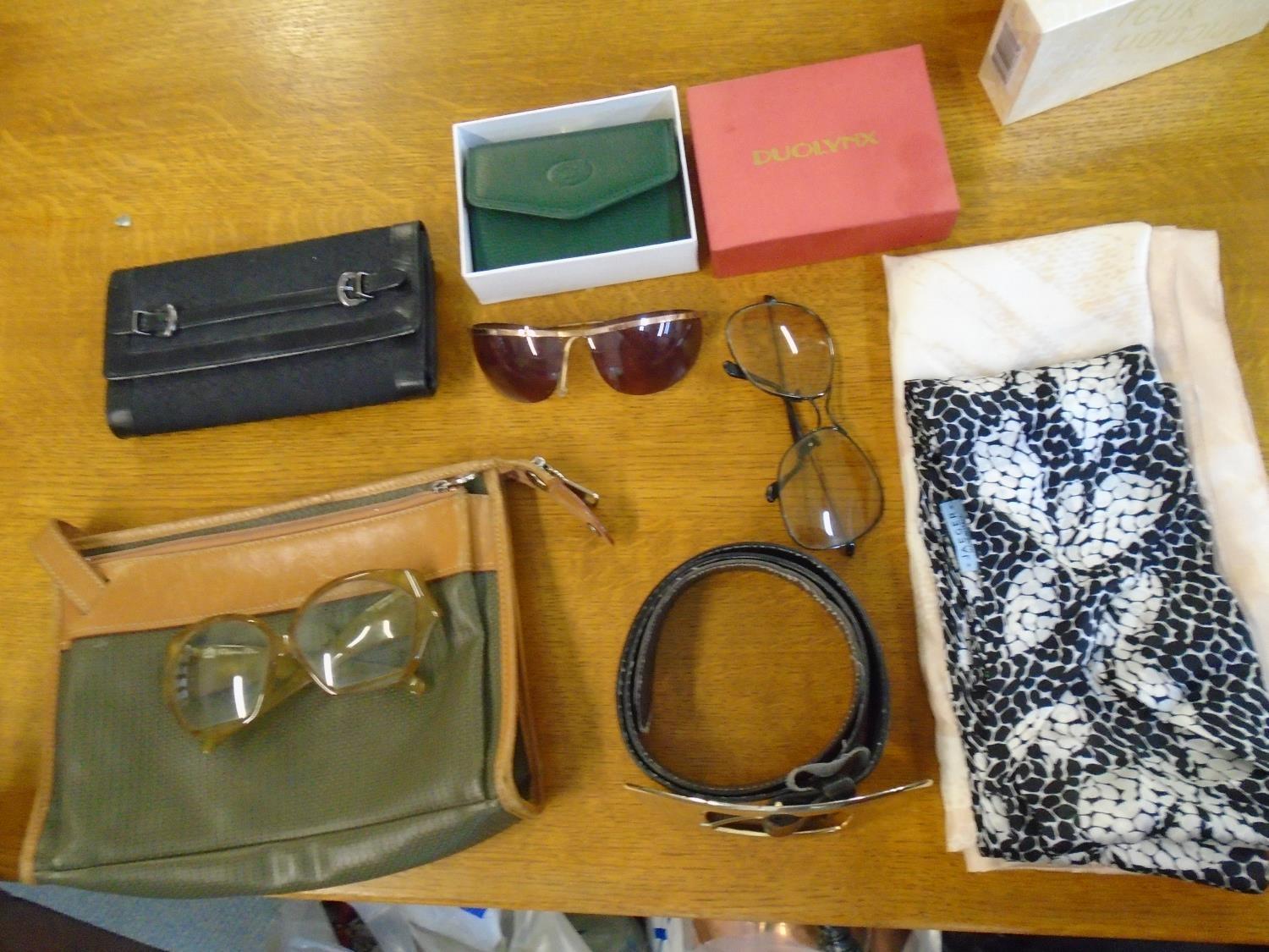 A selection of fashion items to include a Charles Jourdan wash bag, Christian Dior glasses,