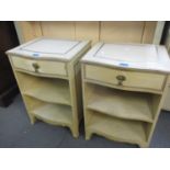 A pair of cream painted Continental pine bedside chests with single drawer and shelves, in cream