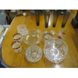 A miscellaneous collection of glassware to include a set of four smoked glass champagne flutes, a