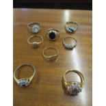 Six 9ct gold rings, 11g, together with two yellow metal rings Location: Cab