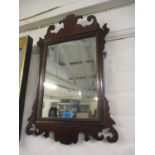 A Chippendale style mahogany wall mirror 38cm x 59cm Location: RWB