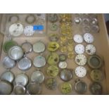 A quantity of pocket watch and wristwatch movements, faces and parts a Viners, London Chronometer