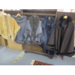Modern ladies outer garments with faux fur and rabbit fur trims to include a Jayley poncho, one size