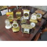 A selection of mantle and anniversary clocks to include those by the London Clock Co, Rhythm, Kundo,
