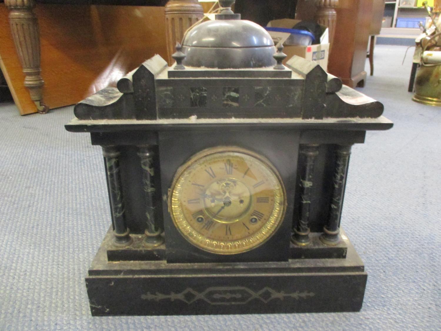 A Victorian black slate mantle clock Location: A3B