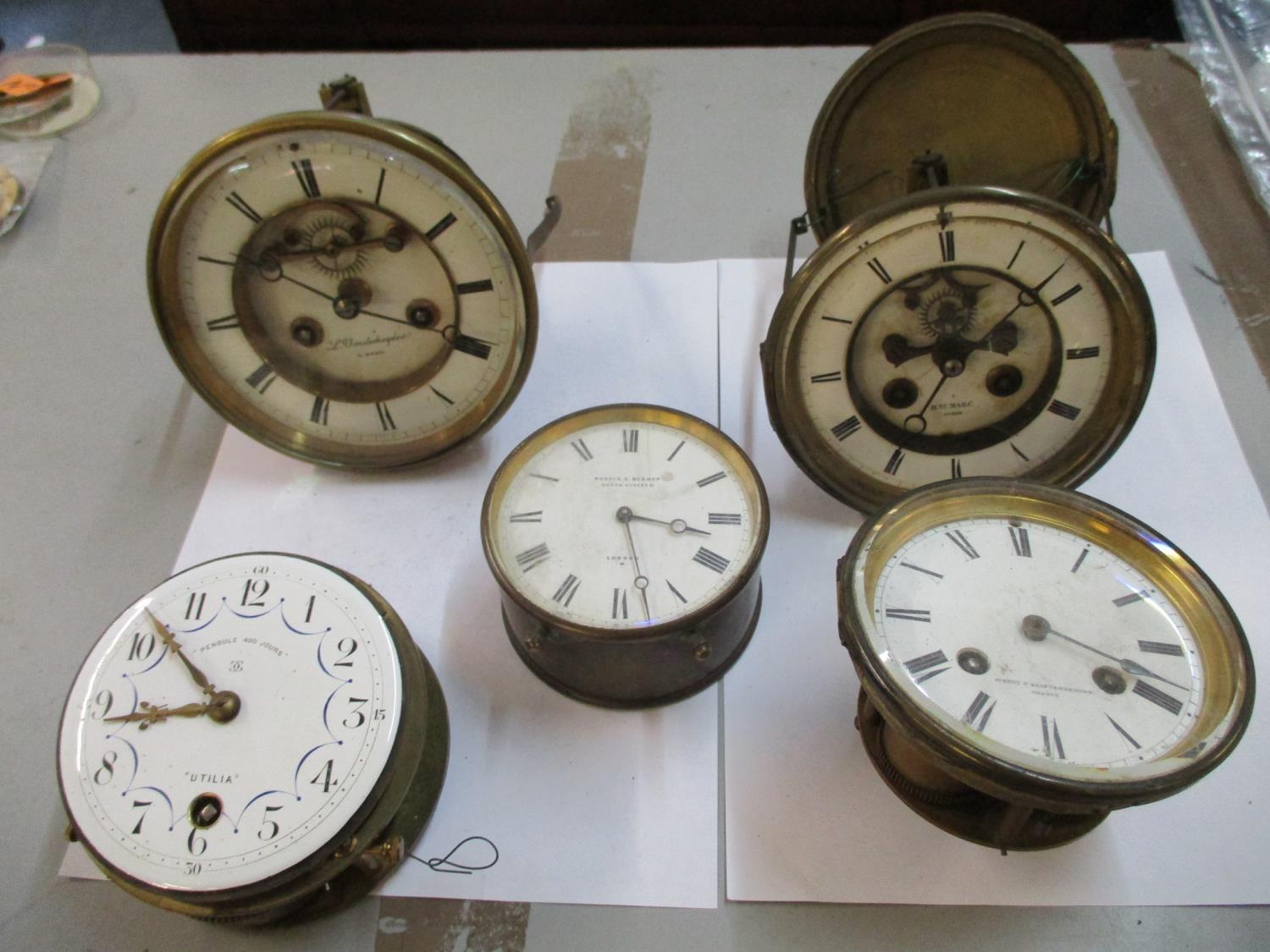 Five 19th/20th century clock movement to include a Henry Marc, Purvis and Bishop, L. Vanderheyden,