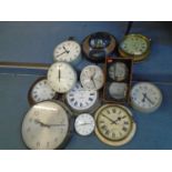 A selection of wall clocks and a Smiths English Clock Systems master clock, circa 1960's, to include
