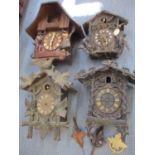 Four 20th century cuckoo clocks to include Black Forest examples A/F Location: Rostrum