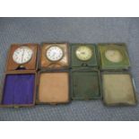 Three early 20th century leather cased travel clocks, 8-days and one leather case Location: 6:3
