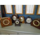 A group of early 20th century mantle clocks to include a Hamilton Sangamo Synchronous wooden cased