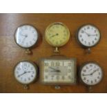 Six vintage eight-day travel clocks to include an Omega Location: Cab