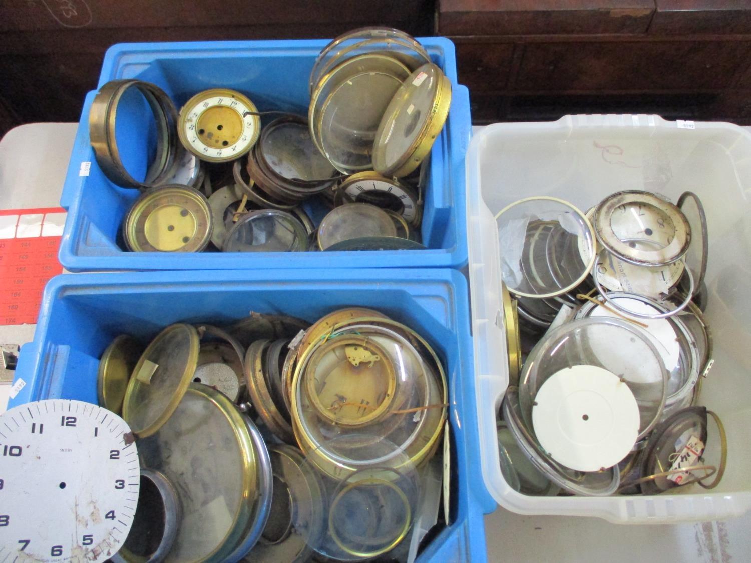 A quantity of 19th and 20th century clock glasses and bezels