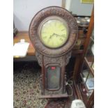 A late 19th/early 20th century large carved mahogany drop dial clock, 136 h x 55cm w Location: BWR