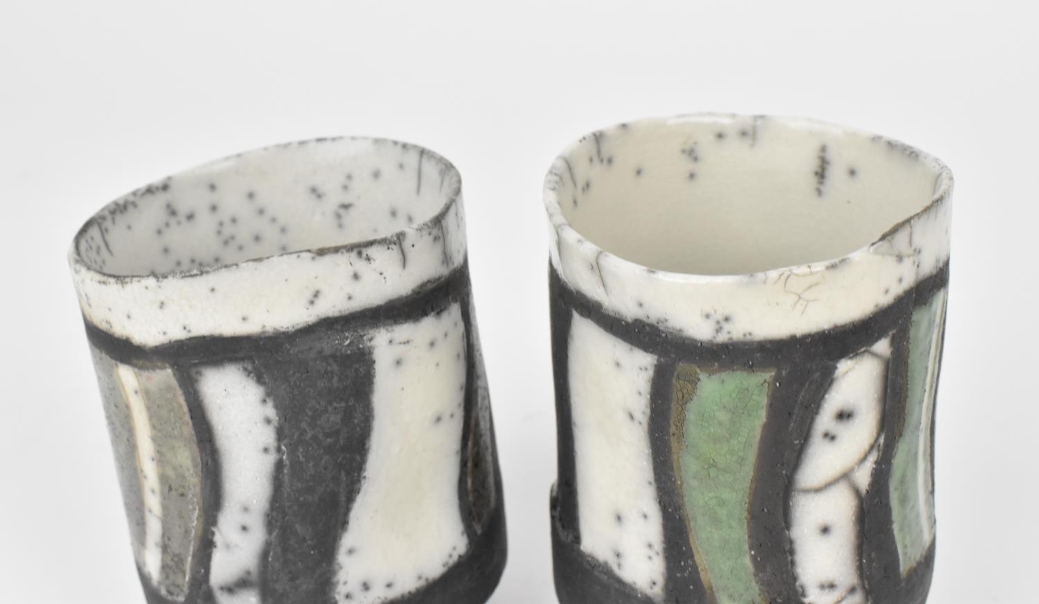 Elizabeth Raeburn (b.1943) British a pair of raku pottery footed cups of tubular form with raised - Image 3 of 4