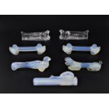 Three Sabino opalescent glass knife holders, comprising a model of a dog, a snail and a rooster, all