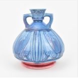 A Victorian Aesthetic style Royal Worcester vase, of bulbous form with blue and pink mottled