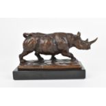 Mark Coreth (b. 1958) British a patinated bronze naturalistic model of a rhinoceros, limited edition