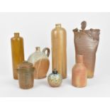A collection of studio salt glazed stoneware and pottery ware comprising a jug, a twin handled