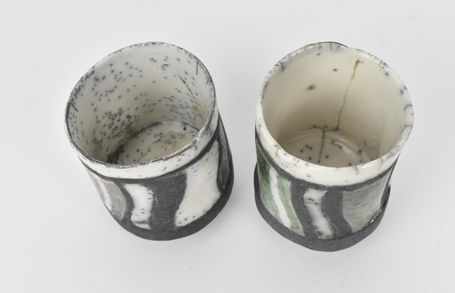 Elizabeth Raeburn (b.1943) British a pair of raku pottery footed cups of tubular form with raised - Image 2 of 4