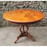 An Italian mid century inlaid marquetry and mother of pearl tilt top occasional table, the