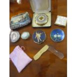 Vintage compacts to include a Stratton blue enamelled compact depicting swans on a lake, a silver