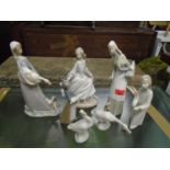 A group of Lladro figurines and animal models to include a woman carrying a basket of baguettes with