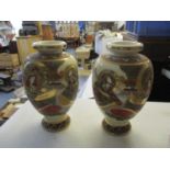 An early 20th century pair of Japanese Satsuma vases 31cm h Location: 5:1