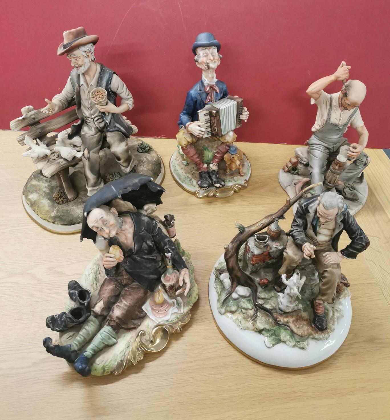 A collection of Italian porcelain figures to include some Capodimonte examples, a model of a shoe