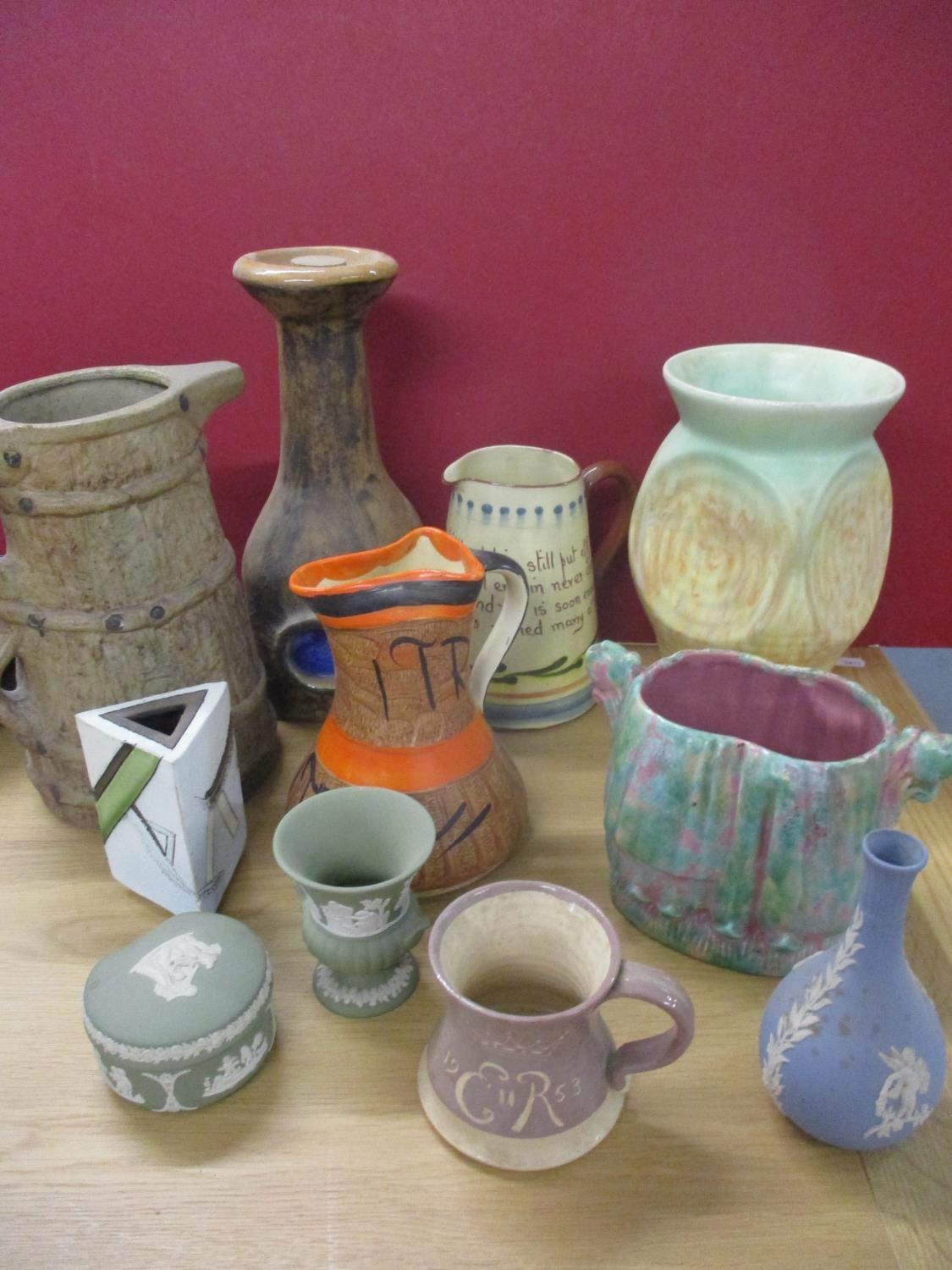 Mid to late 20th century pottery to include a Motto ware jug, a Myott jug and a Beswick vase