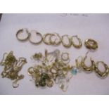 Two 9ct gold chains stamped 375, together with five pairs of 9ct gold hoop earrings stamped 375, and