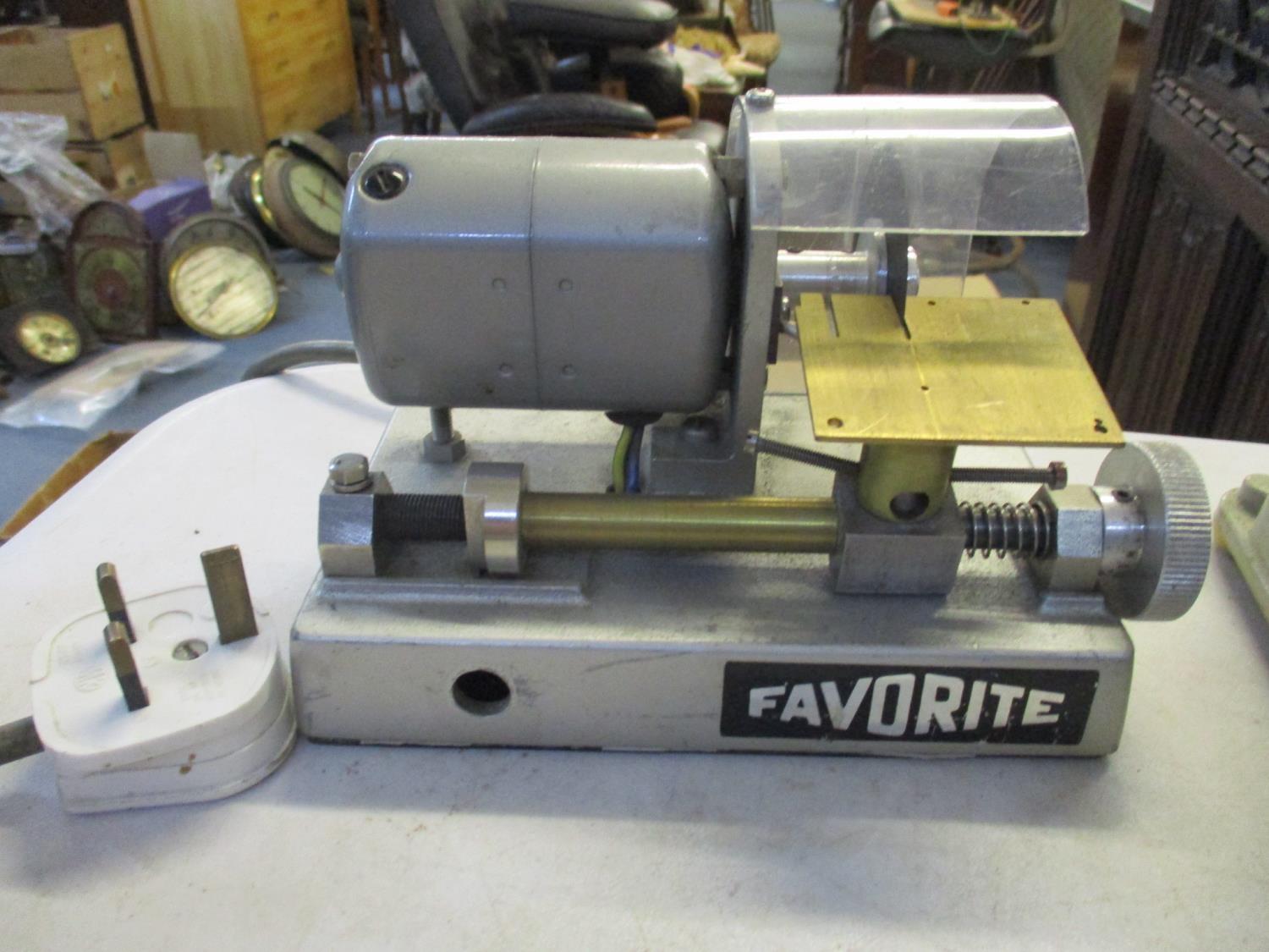 A vintage Favorite electric bracelet cutter for watch makers Location: 9:3